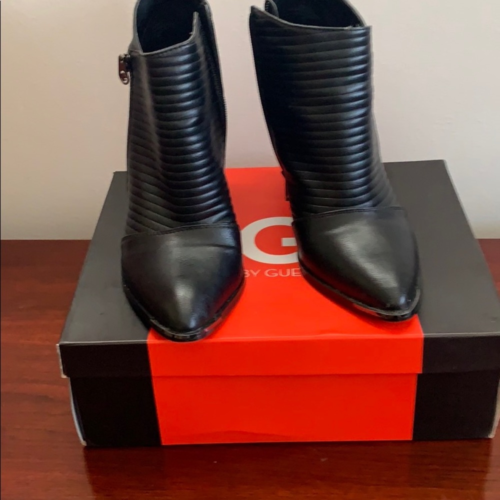 Women’s booties black by Guess size 9